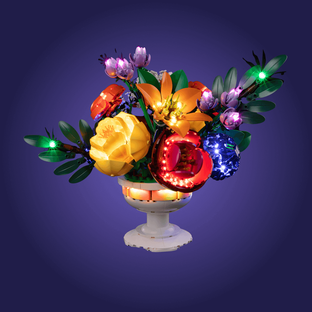 Decorative lego flower 10345 arrangement with colorful lights on a dark background