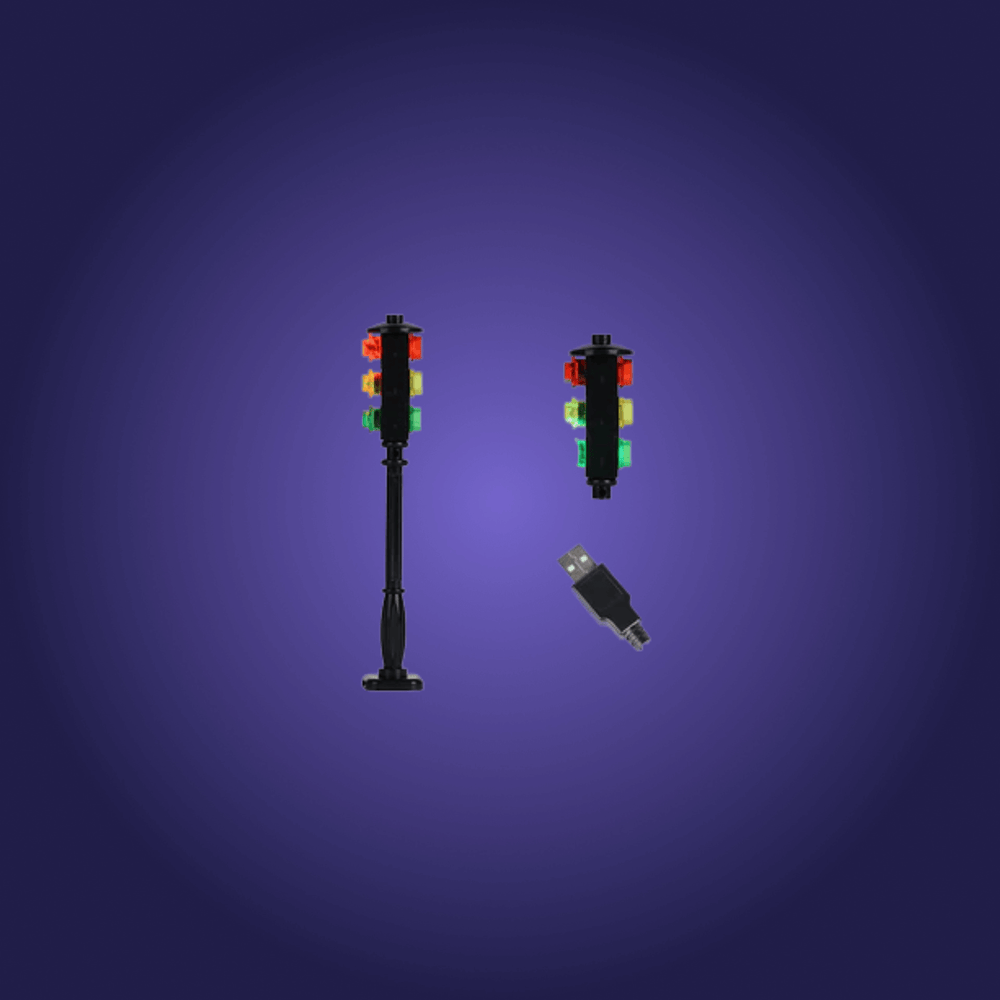 Lego bricks of traffic lights with led lights in a dark blue background