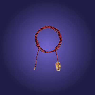 Small rectangular light bulb with red and black wiring on a dark blue background