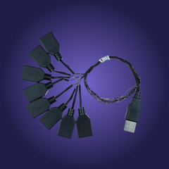 USB cable with multiple connectors on a purple background