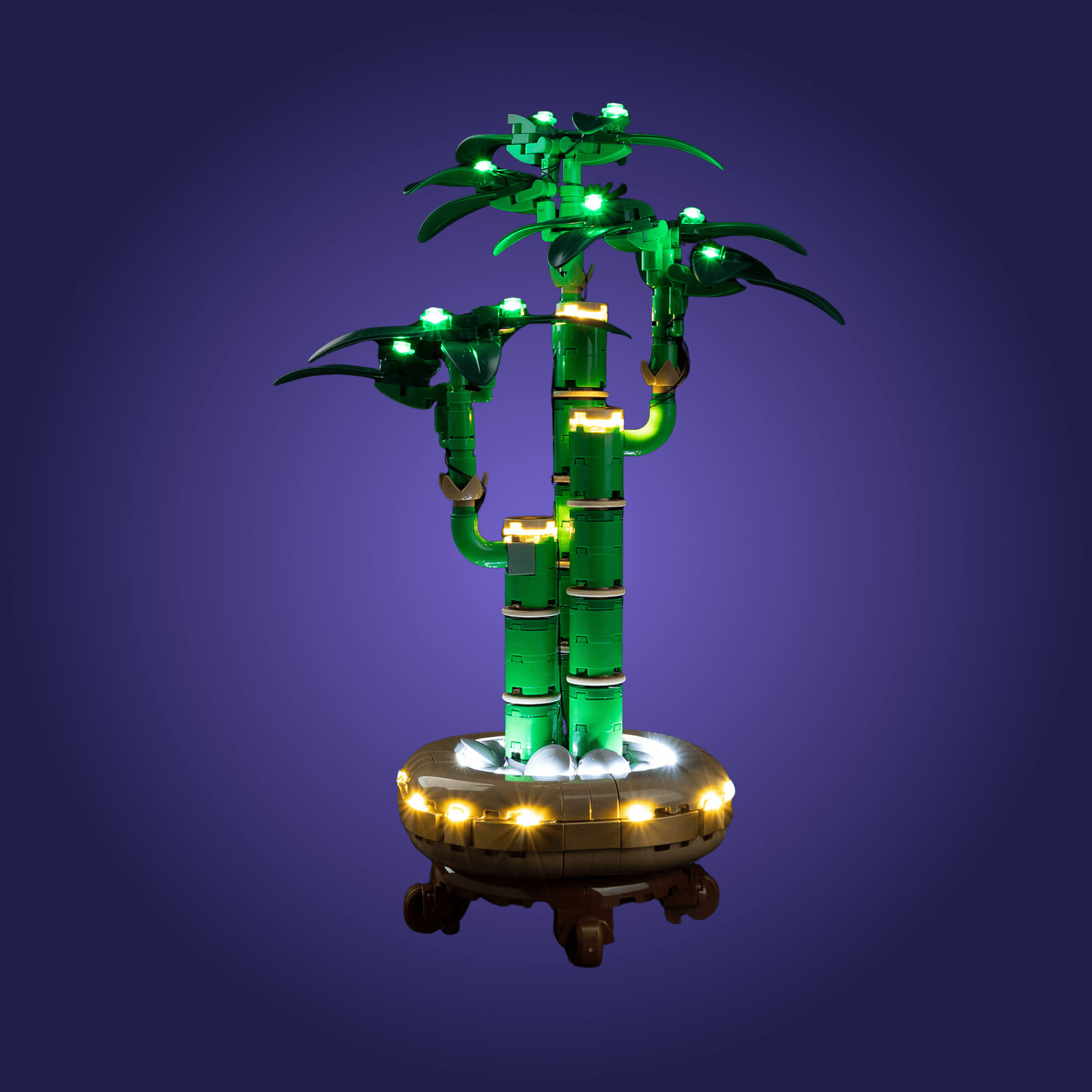 Decorative LED light on a Lego bamboo plant set 10344 on a dark purple background