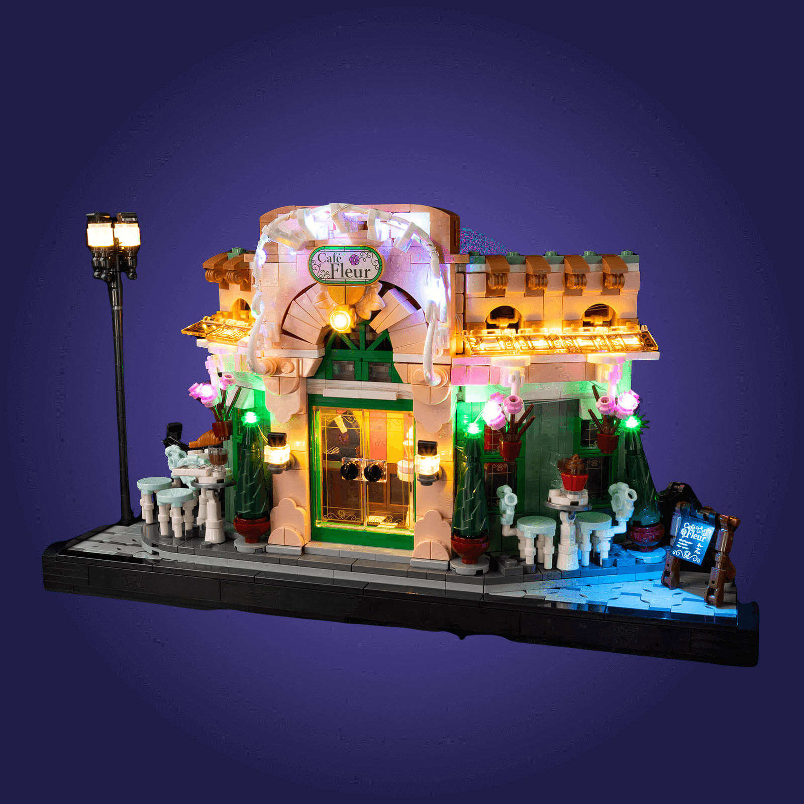 Light-up LEGO model of a quaint store 10362 with decorative elements on a dark background