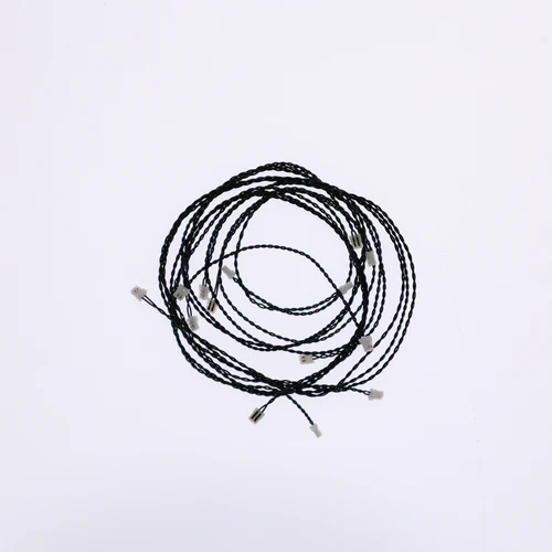 Coiled black cable on a white background