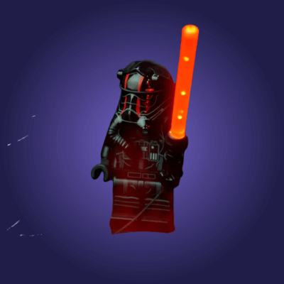 LEGO figure of a character with a glowing orange weapon on a dark purple background